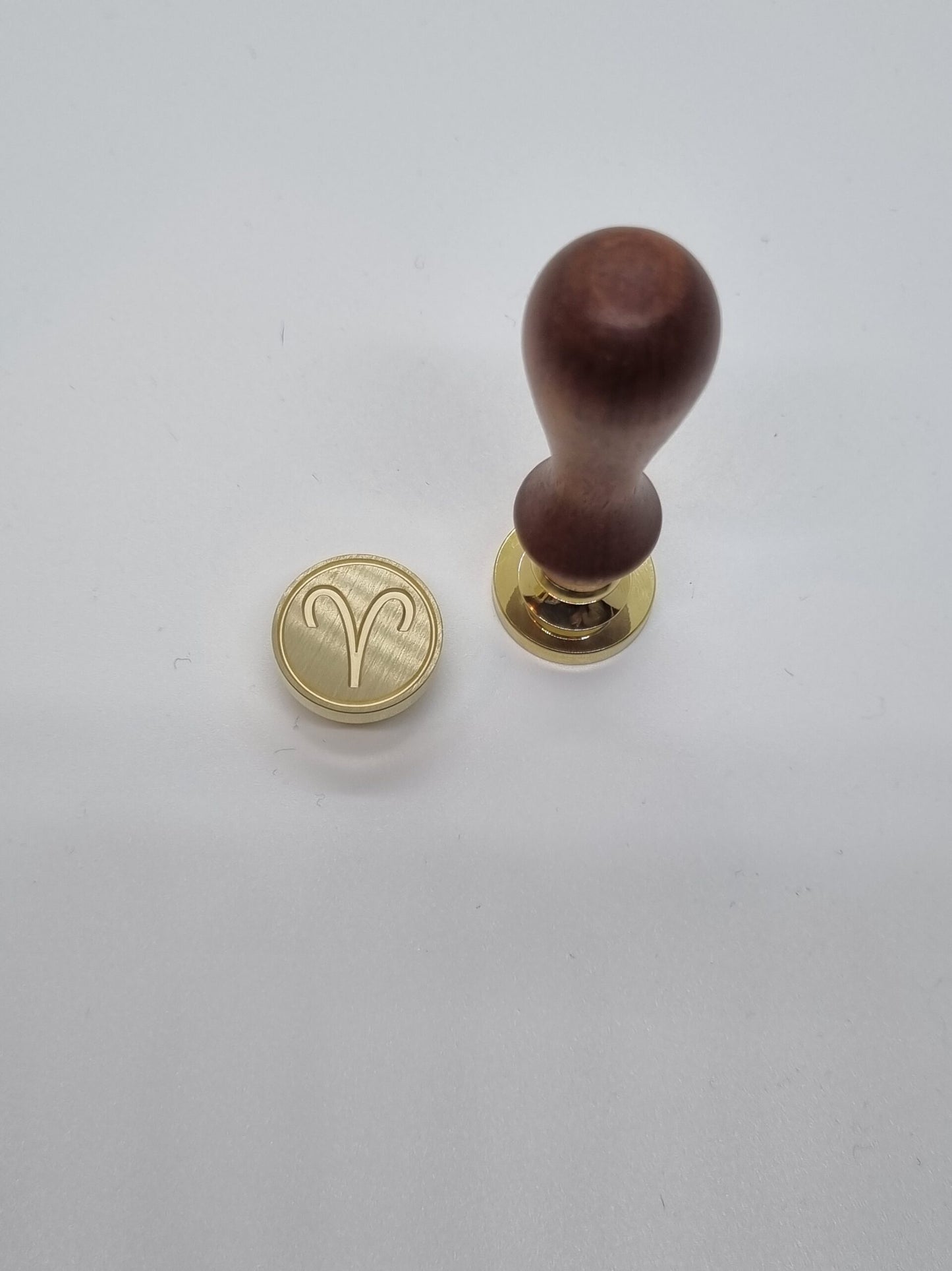 Sigillstämpel, symbol