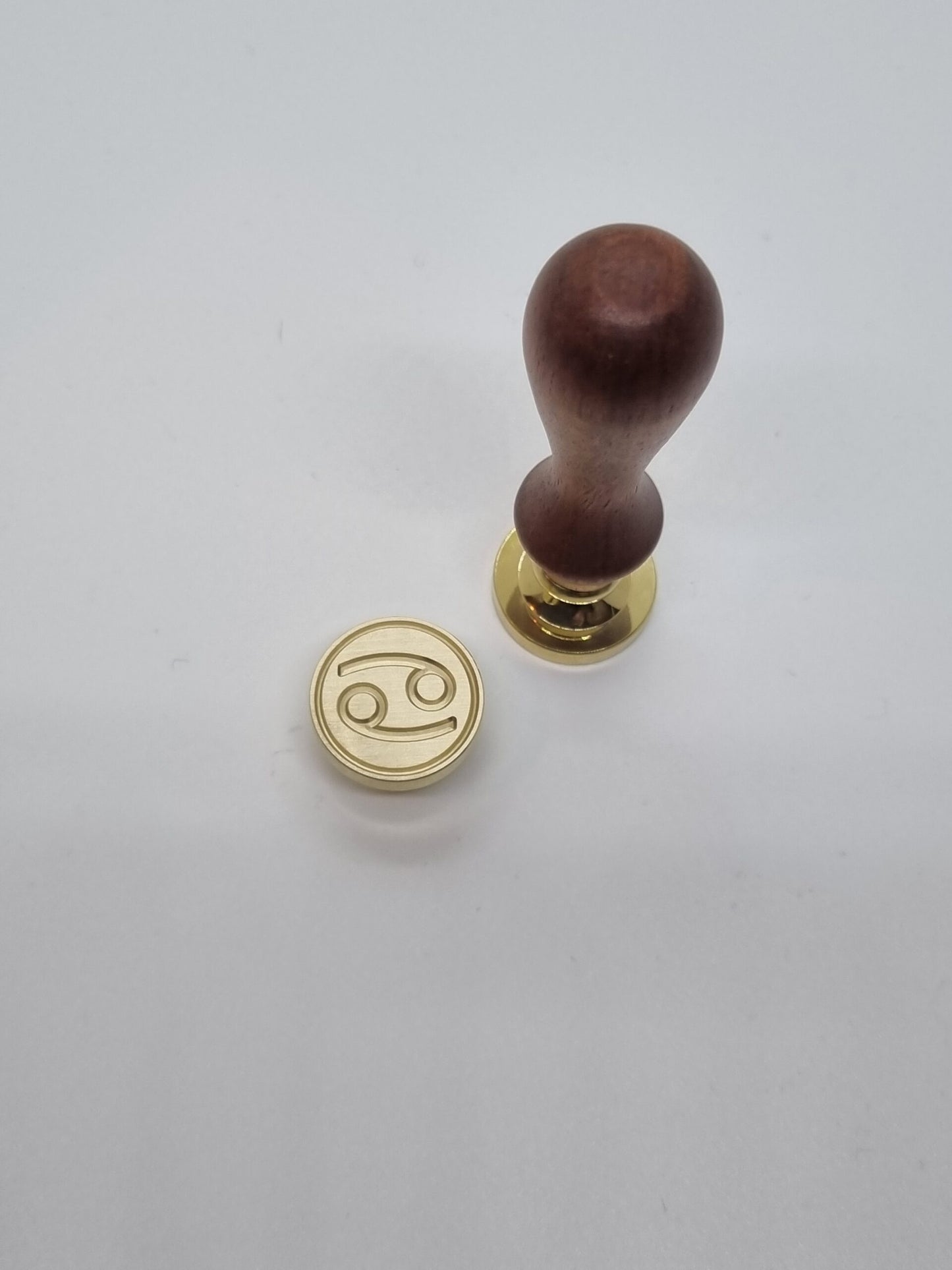 Sigillstämpel, symbol
