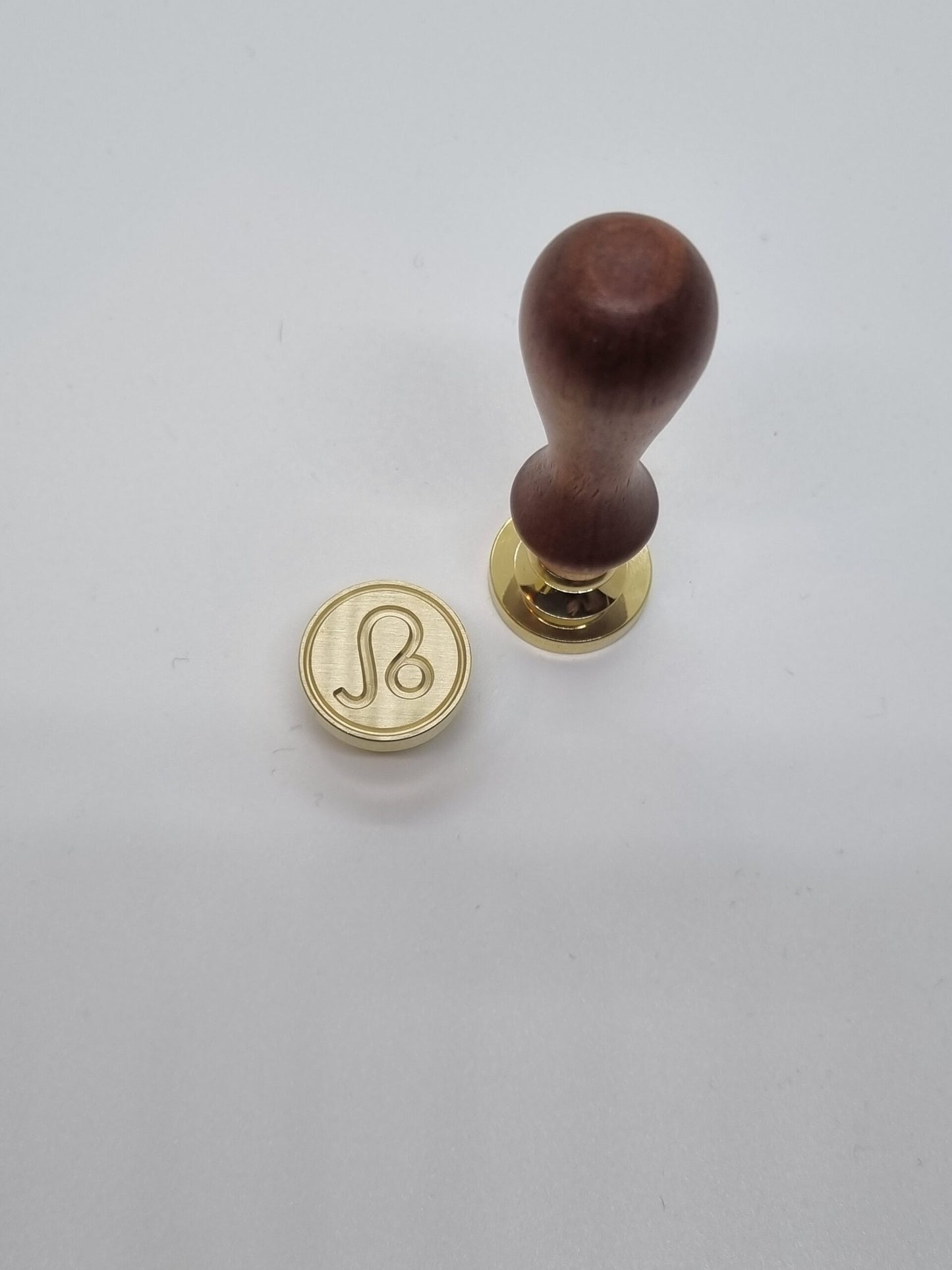 Sigillstämpel, symbol