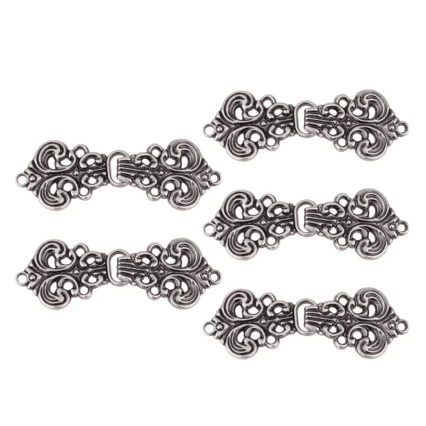 Dräktspänne, metall